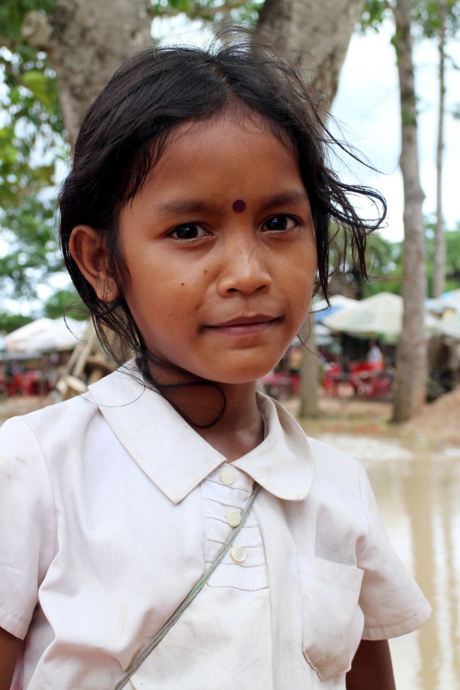 A Child Vendor at Angkor